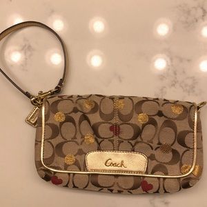Authentic coach gold clutch